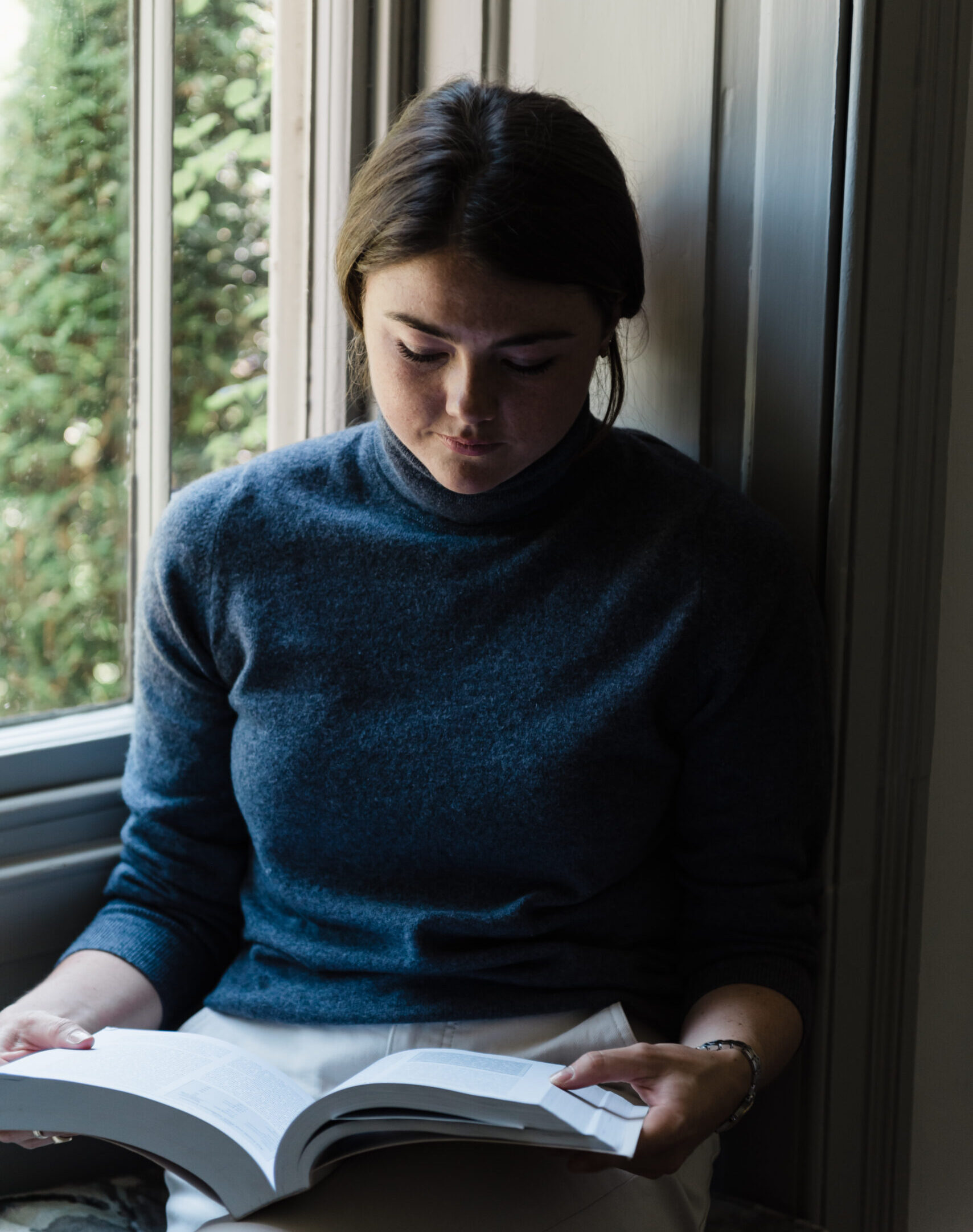 Georgina reading a book